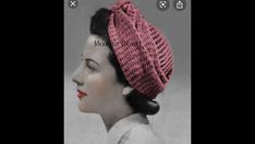 an old photo of a woman wearing a pink knitted hat with her hair in a bun