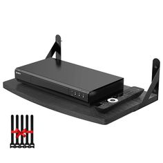 an image of a black router with four antennas attached to the top and bottom