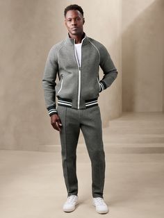 Athletic with a twist, this scuba-knit track pant is made from a sumptuously soft cotton blend with notable houndstooth — the perfect fusion of old-school style and modern athleisure.  TAPERED FIT: Mid rise.  Relaxed fit with a tapered leg.  Flat k Sporty Sweatpants With Straight Hem For Fall, Sporty Straight Hem Pants For Fall, Fall Athleisure Joggers With Straight Hem, Sporty Fall Joggers With Elastic Side Panels, Athleisure Sweatpants With Ribbed Cuffs For Fall, Fitted Sporty Sweatpants With Ribbed Cuffs, Sporty Fitted Sweatpants With Ribbed Cuffs, Sporty Pants With Ribbed Waistband For Fall, Sporty Fall Sweatpants With Ribbed Waistband