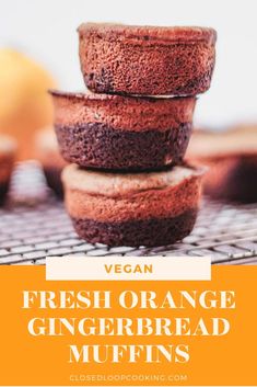 fresh orange gingerbread muffins stacked on top of each other with the title vegan