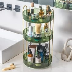 a bathroom counter with three tiered shelves filled with personal care products