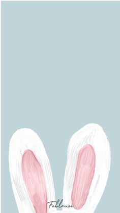 two white and pink bunny ears on a blue background