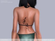 the back of a woman's body with tattoos on her chest and bottom part