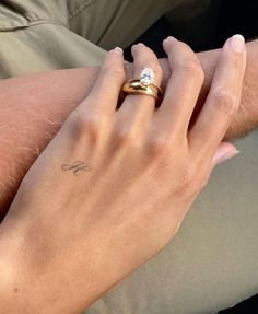 Wedding Hand Tattoos, Tattooed Ring Finger, Conservative Tattoo Placement, Cursive H Tattoo, Initial Tattoo Hand, Initial Hand Tattoo, Tattoo Couple Aesthetic, Married Tattoos, Siblings Tattoo Ideas For 4