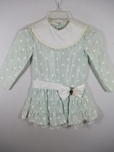 "Vintage 70s 80s Bonnie Jean Drop Waist Dress, Girl's Size 6, Polka Dot, Mint Green, Satin Approx. 13\" pit to pit 25\" waist and 25\" length. Has a few discoloration areas." Spring School Dress With Peter Pan Collar, Retro Swiss Dot Dress For Spring, Vintage Dresses For School In Spring, Vintage Swiss Dot Dress For Spring, Vintage Swiss Dot Dresses For Spring, Vintage Polka Dot Long Sleeve Dresses, Vintage Long Sleeve Polka Dot Dress, Retro Dress With Ruffles And Peter Pan Collar, Fitted Retro Swiss Dot Dress