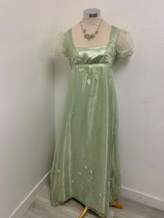 Elegant Green Victorian Costume Dress, Elegant Green Victorian Dress For Costume Party, Green Victorian Dress For Wedding, Green Victorian Wedding Dress, Spring Costume Dresses With Fitted Bodice, Elegant Green Gown For Costume Party, Green Empire Waist Wedding Dress, Green Fitted Bodice Organza Dress, Green Organza Ball Gown