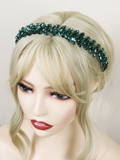 a blonde wig wearing a green headband