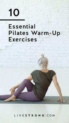 a woman sitting on the floor with her legs crossed in yoga position and text overlay reads 10 essential pilates warm - up exercises