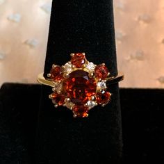 Brazilian Red Citrine, And White Zircon Flower Ring. Set In Vermeil Yellow Gold Over .925 Sterling Silver. Tgw 3.20 Carats. Ring Is Size 9. Comes New In Box For Safekeeping And Gift Giving. Nwt *Zircon Is A Natural Gemstone Mined From The Earth And Not To Be Confused With The Man Made “Cz” Or Cubic Zirconia Classic Red Cluster Ruby Ring, Classic Red Ruby Cluster Ring, Cluster Ruby Rings In Red, Red Cluster Fine Jewelry, Red Multi-stone Ruby Cluster Ring, Red Ruby Multi-stone Cluster Ring, Cluster Red Multi-stone Ruby Ring, Red Ruby Cluster Ring With Multi-stone, Cluster Red Ruby Ring With Multi-stones