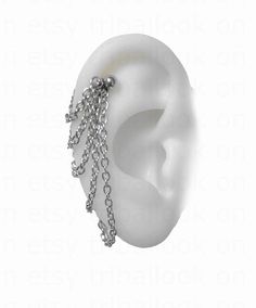 an ear with chains attached to it