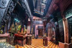 an ornately decorated room with checkered flooring