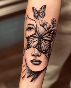 a woman's face with butterflies and flowers on her head, as well as a butterfly