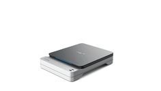 an external hard drive sitting on top of a white surface