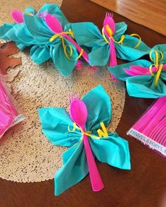 some pink and blue items on a doily