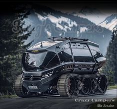 an armored vehicle parked on the side of a road in front of trees and mountains