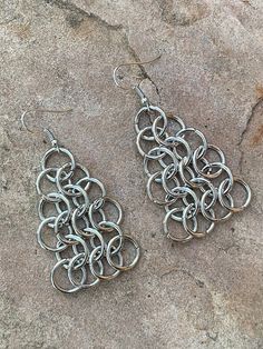 A pair of chainmail earrings European pattern. Simple and very versatile style. Triangular shape.  nickel and lead free. Silver Chainmail Metal Jewelry, Silver Metal Jewelry With Chainmail, Silver Metal Chainmail Jewelry, Silver Chain Link Earrings As Gift, Silver Chain Link Earrings For Gift, Handmade Silver Metal Chandelier Earrings, Metal Chain Chandelier Earrings, Metal Chain Drop Chandelier Earrings, Metal Chandelier Earrings With Chain Dangle