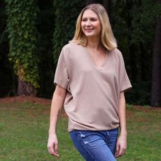 Introducing our chic and contemporary women's fashion top, where style meets comfort effortlessly. The cocoon sleeves add a modern twist, offering a relaxed yet flattering silhouette that drapes beautifully. Whether you're heading to a brunch date or a casual evening out, this versatile piece effortlessly transitions from day to night. Pair it with your favorite jeans for a laid-back vibe, or dress it up for a polished look. Make Your Outfit, Fall Faves, Southern Women, Brunch Date, Casual Evening, Fashion Top, A Skirt, Oversized Tee, Short Rompers