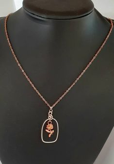 Who doesn't love a fairytale? Beautiful dark rose gold plated chain with an 18 gauge rose gold plated wire vase and a rose (alloy) in the middle. (2x1cm). The pendant size in total is 4cm, The length of the chain is 44.5cm with an added 5cm of rose gold extension chain.  This necklace also can come as part of a set. Refer to the rose gold earrings in my shop. Perfect for a birthday, anniversary or valentines day gift. Valentine's Day Rose Gold Adjustable Chain Necklace, Valentine's Day Rose Gold Necklaces With Charms, Heart Shaped Rose Gold Chain Necklace For Valentine's Day, Wire Vase, Beauty And The Beast Necklace, Heart-shaped Rose Design Necklace For Valentine's Day, Heart-shaped Rose Gold Chain Necklace For Valentine's Day, Dark Rose, Necklace Rose Gold