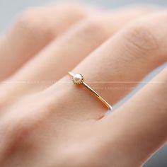 Minimalist White Gold Jewelry For Marriage, Simple Gold Solitaire Jewelry, Delicate Gold Crystal Ring, Gold Crystal Birthstone Ring For Wedding, Gold Crystal Wedding Ring With Birthstone, Dainty Gold Opal Ring For Anniversary, Gold Wedding Crystal Birthstone Ring, Gold Wedding Crystal Ring With Birthstone, Simple Round Cut Wedding Jewelry