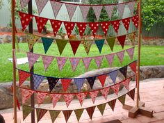 an outdoor display with flags and bunting