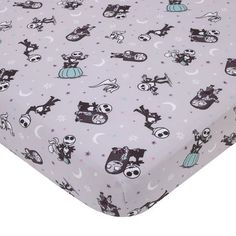 a bed sheet with cartoon characters on it