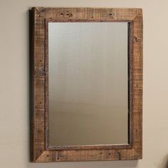 a mirror mounted to the side of a wall