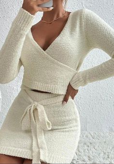 -Long Sleeve V-Neck Top- Mini SkirtMade In: China Belted Skirt Outfits, Sweater Mini Skirt, Sweater Skirt Set, Crop Pullover, Rock Outfit, Cropped Pullover, Skirt Belt, Strap Design, Knit Skirt