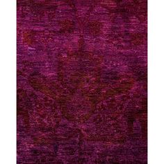 a purple rug with an ornate design on the top and bottom, it is very soft