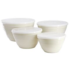 three white bowls with lids on each side