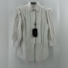 Nwt $1100 May Have Minor Dirt From Storage Size 36 It White With Dramatic Ruffles Comes With Original Collar Stays Measurements Bust 18” Sleeve Length 19” Length 30” Designer Fitted White Shirt, Designer Office Tops, Designer White Tops For Workwear, Designer White Blouse For Work, Designer Button-up Tops For Daywear, Luxury Fitted Shirt For Daywear, Luxury Fitted Daywear Shirt, Designer Fitted Shirt For Daywear, Designer White Button-up Blouse