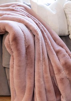 Beautifully Posh! Who doesn't love a soft faux fur throw blanket in a rich Rosewood pink tone? Posh Mink Rose wood throw blanket by Fabulous Furs is like liquid running through your fingers. Super soft, drapey and ideal for warmer clients due to its weight. Light-weight Mink reverses to baby-soft velvet. 100% Polyester Faux Fur Pile; 100% Polyester Backing & Lining. Machine Wash and Line Dry. Do Not Bleach. Size: 60" x 72" Imported from China. Ring Light Mirror, Faux Fur Throw Blanket, Fabulous Furs, Home Goods Decor, Faux Fur Throw, Custom Glass, Blankets For Sale, Decanters, Getting Cozy