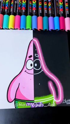 some markers and pens are on top of a drawing book with an image of spongebob