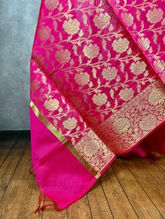 Beautiful Hot Pink Color Dupatta with Floral Jaal design Perfect Gift !! Very Light Weight Item: DupattaBase color : Hot PinkFabric : Semi Silk (Not Pure Silk)Work : Zari Weaved with tasselsLength of the Dupatta : 96 inches approx.Width of the dupatta : 38 inches (Approx.)Store Policies- No return or exchange will be accepted for color variations.- No return or exchange will be accepted if the color does not match your other clothing or your partners or anyone else.- Since this Dupatta is handma Dupatta For Lehenga, Jaal Design, Indian Dupatta, Stole Scarf, Readymade Blouse, Scarf Gift, Pink Fabric, Indian Wear, Pure Silk