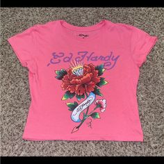 Ed Hardy Uo Exclusive Roses Baby Tee In Size Medium, And Pink Color. Never Worn, And No Imperfections. Casual Pink T-shirt With Rose Print, Casual Pink Rose Print T-shirt, Fitted Pink T-shirt With Floral Print, Trendy Pink Urban Outfitters Tops, Trendy Pink Tops From Urban Outfitters, Urban Outfitters Pink Crew Neck Top, Girly Tops, Y2k Outfits, Pinterest Outfits