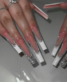 White Rhinestones Nails, White Full Set Nails, White Rhinestone Acrylic Nails, Silver And White Acrylic Nails, French Tip Nails With Gems Rhinestones, Cross Acrylic Nails, White Bling Nails, Milky White Nail Designs, White Nails With Silver