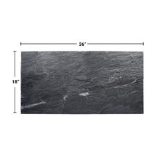 a black marble slab with measurements for the width