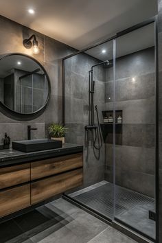 a bathroom with a sink, mirror and shower stall in the middle of it's walls