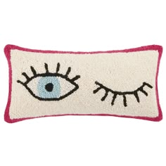 a pillow with an eye on it