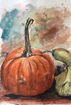 a watercolor painting of two pumpkins on a table