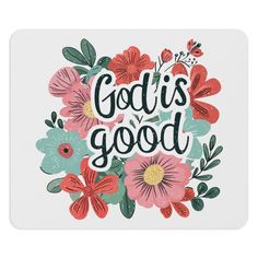 a coaster with the words god's good on it and colorful flowers around it