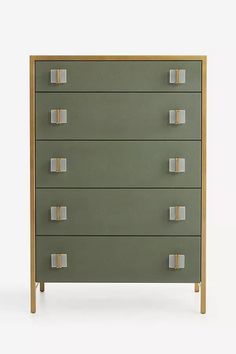 a green dresser with four drawers and three doors on each drawer, in front of a white background