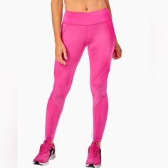 Perfect Waistband Shiny Tonal Zumba Outline All Over Print Multicolor Branded Rubber Patch On Left Thigh That Says "Zumba Dance Co." Mesh Panels At Knee Slim Fit 26" Inseam Length Full-length Sports Tights, Pink Activewear For Jogging, Pink Tight Bottoms For Running, Athleisure Training Tights, Running Bottoms With Elastic Side Panels, Running Leggings With Elastic Waistband, Nylon Pants For Gym, Pink Go-dry Yoga Pants, Nylon Yoga Pants For Training