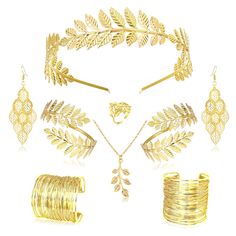 a set of gold jewelry including bracelets, rings and earring sets with leaves on them