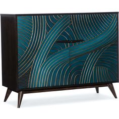 a blue and black cabinet with an abstract design on the front, two doors open