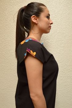 Blouse multicolored handmade by Mexican artisans. . It is important to mention that absolutely all the process is done by hand, so the size, shape and color can varybetween pieces. . Measurements:↕ 26 4/7 in↔ 20 in Black Cotton Top With Geometric Embroidery, Black Cotton Blouse With Geometric Embroidery, Traditional Handmade Multicolor Tops, Traditional Multicolor Handmade Tops, Multicolor Cotton Top With Embroidered Sleeves, Traditional Multicolor Embroidered Top With Sleeves, Artisan Multicolor Cotton Top, Fitted Multicolor Top With Geometric Embroidery, Fitted Multicolor Blouse With Geometric Embroidery