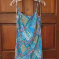 Brand New "My Michelle" Dress With Floral/Geometric Pattern. New With $50 Tag. Turquoise, Green, Lavender, Blue,Pink, Green. Lined With Solid Turquoise Lining. Straps. Size 11/12. Polyester. Machine Wash. Length Is 53" With An Up-Down Bottom. Casual Printed Turquoise Dress, Casual Turquoise Printed Dress, Floral Geometric Pattern, Green Lavender, Floral Geometric, Lavender Blue, Turquoise Green, Aesthetic Outfit, New Me