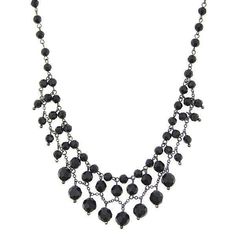 This vintage inspired, jet black beaded, hematite-tone necklace channels pure decadence. Polished hematite tone links are strewn with a graduating pattern of onyx black color beads. Measurements: 16"L x 1"W 2028 Jewelry Collection 2028 Jewelry features more fashion forward design choices comprised of premium components. The collection is enhanced with noticeable statement pieces that respect vintage aesthetics, while integrating them into a more refined fashion jewelry collection that fits with Luxury Bohemian Black Beads Jewelry, Gothic Crafts, Channel Jewelry, Refined Fashion, Vintage Bohemian Style, 1928 Jewelry, Black Bead Necklace, Color Beads, Black Necklace