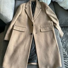 Purchased For $400 From Banana Republic And Have Never Worn. I Am 6’5 And The Jacket Fits Me Well, Would Work On Most People 6 Feet Or Taller. Please Message With Questions Or Offers! Khaki Long Single Breasted Outerwear, Single-breasted Long Khaki Outerwear, Long Single-breasted Khaki Outerwear, Long Khaki Single-breasted Outerwear, Beige Long Single-breasted Outerwear, Beige Long Outerwear With Pockets, Long Khaki Outerwear For Work, Long Brown Outerwear For Work, Beige Long Coat For Business