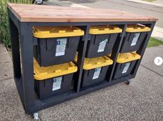 several plastic bins are stacked on top of each other