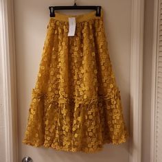 Nwt, Beautiful Size 2, Rare, Sold Out, Floral Lace Flared Skirt. Fixed Waste Band, Partially Lined. Length 32", Waist 25". Color Is Mustard Seed. Skirt Is A Very Nice Weight, 100% Polyester. Side Zipper With Hook Closure. No Lowball Offers Please Stephen Marks Established French Connection, A Uk-Based Global Retailer And Wholesaler Of Fashion Clothing, In 1972 A Year After The Film Of The Same Name Was Released. French Connection Set Out With The Aim To Create Design-Led, Fashionable Clothing. T Yellow Fall Party Skirt, Black Ruffle Mini Skirt, Floral Long Skirt, Yellow Floral Skirt, Shiny Skirts, Long Floral Skirt, Hippie Skirts, Green Mini Skirt, Mini Pencil Skirt